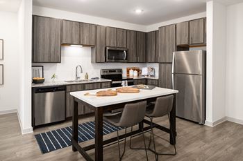 Chef-inspired kitchen with granite countertops*